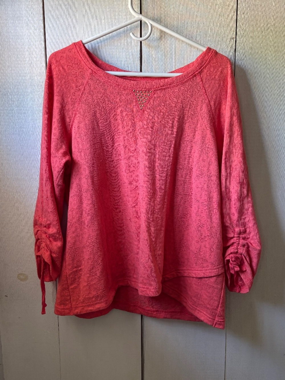 Woman’s peachy pink hearts of palm thin sweatshirt
